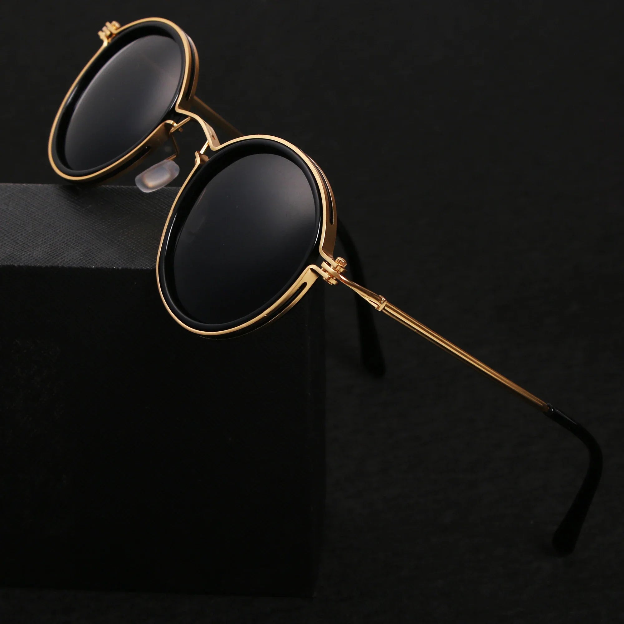 round metal-frame sunglasses with dark lenses