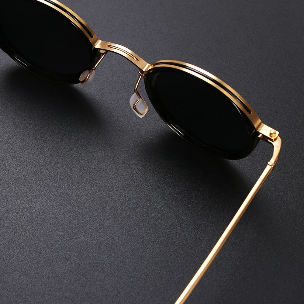 round metal-frame sunglasses with dark lenses