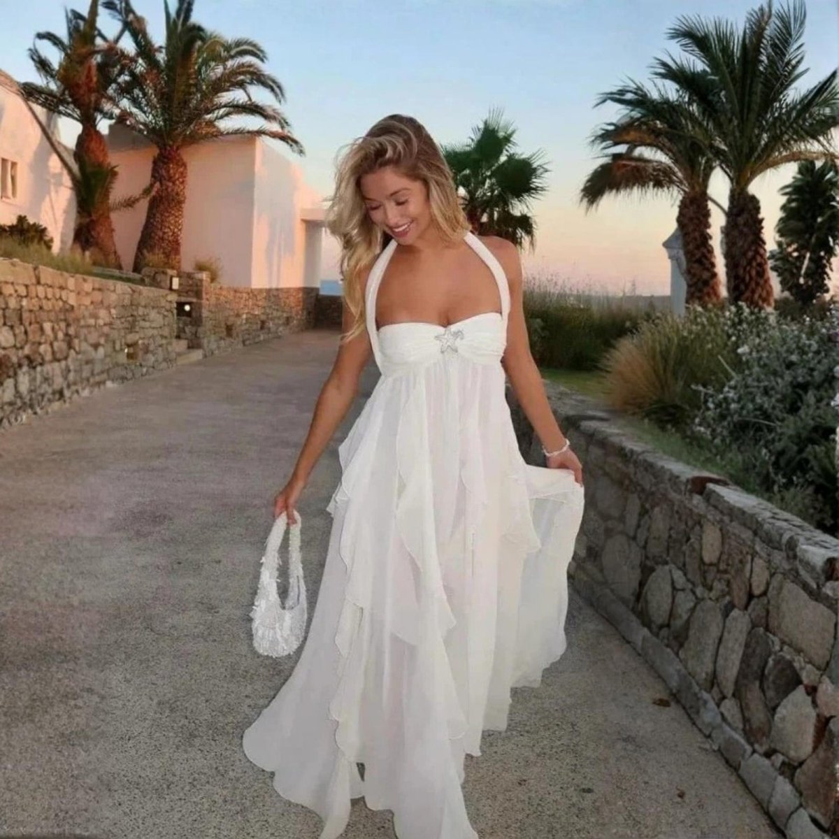 Women's purple embellished maxi dress with an open back and long sleeves
