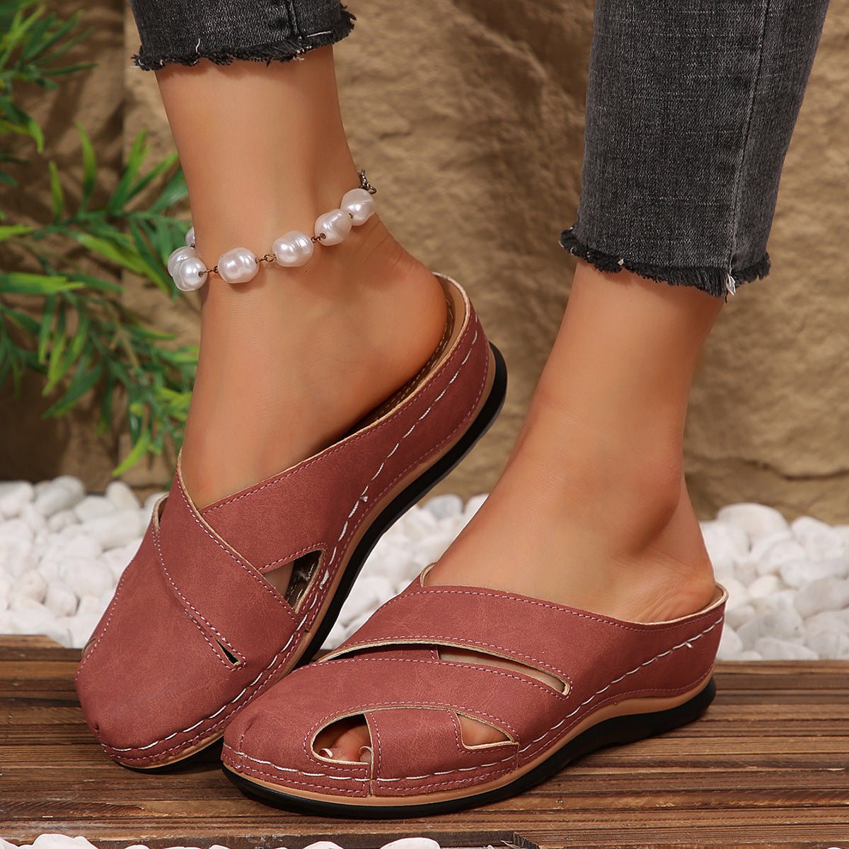 Women's black slip-on mule sandals with cushioned sole and open toe