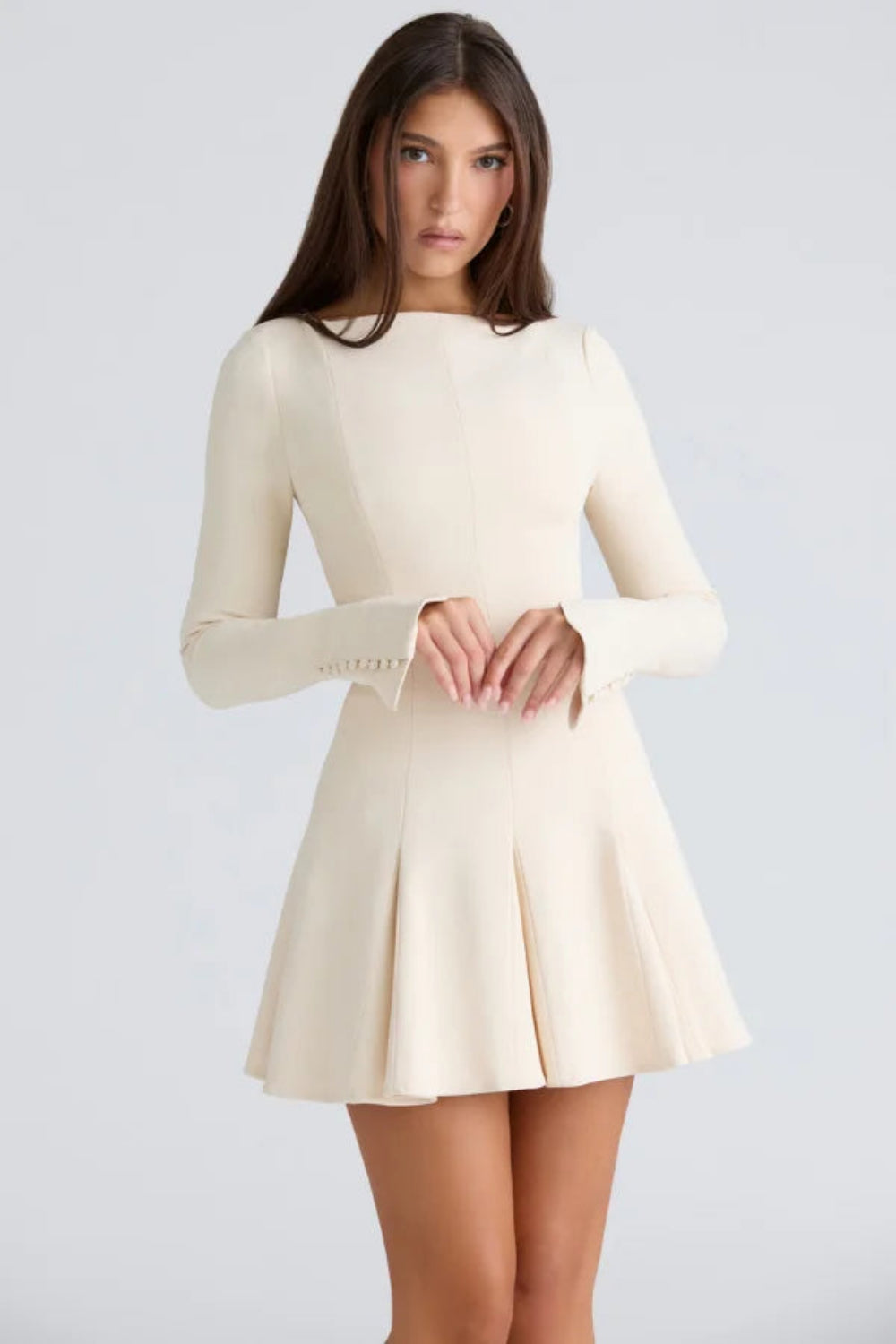women's a-line dress with a boat neck and pleated detail