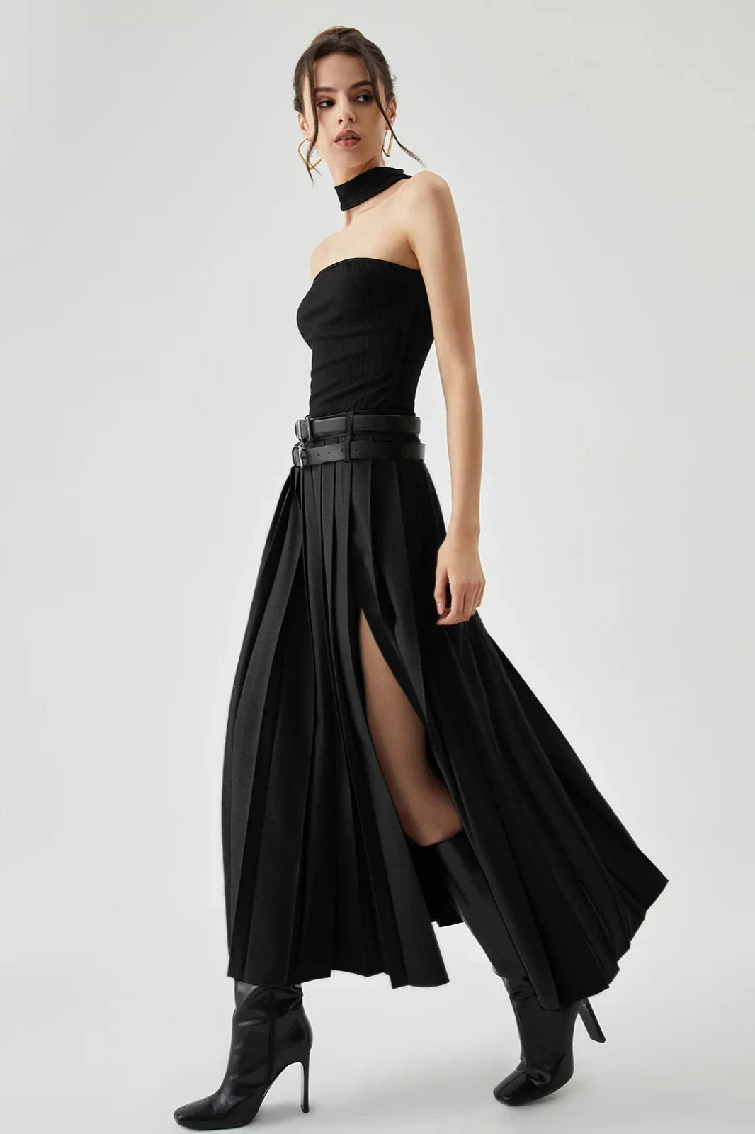 Women's gold pleated maxi skirt with a side split