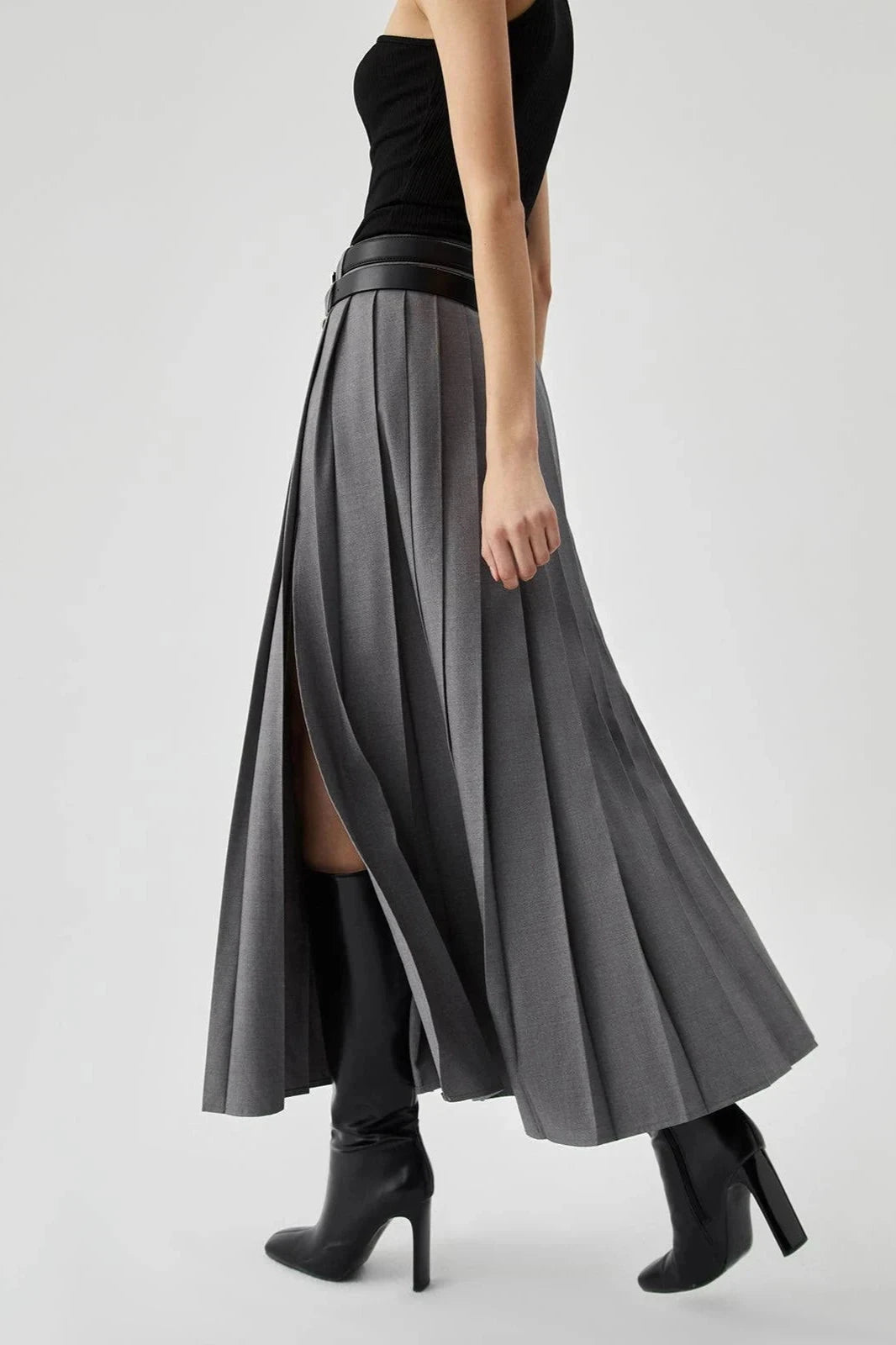 Women's gold pleated maxi skirt with a side split