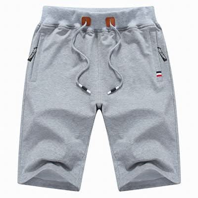 Men's white knee-length jersey shorts with zip pockets