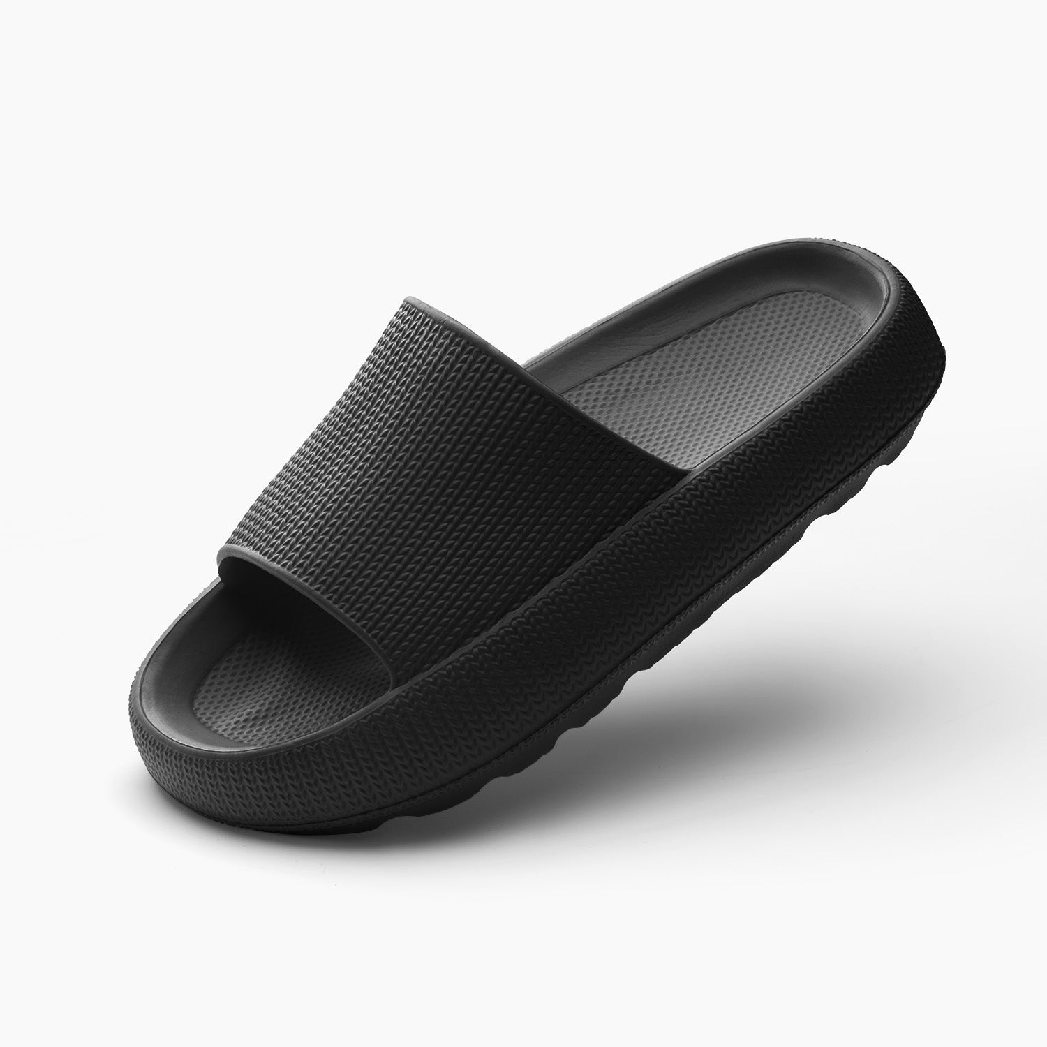 Women's black cushioned cloud slides with thick sole