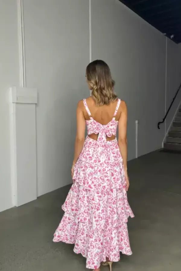Women's pink floral maxi dress with a tiered ruffle skirt