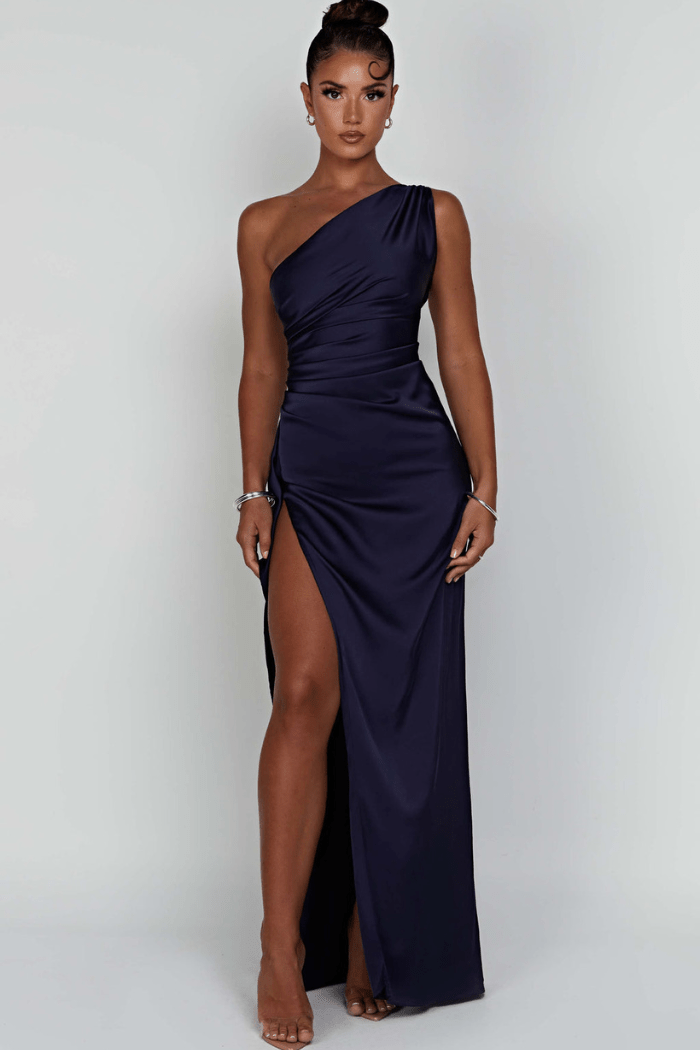 Women's navy blue satin one shoulder maxi dress with a thigh split