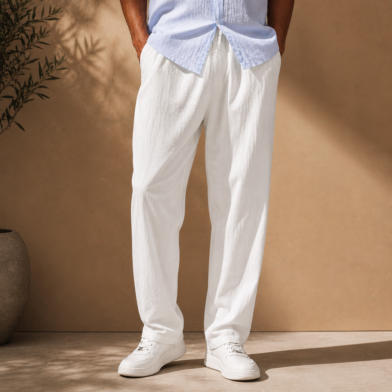 Men's white elasticated waist straight leg trousers