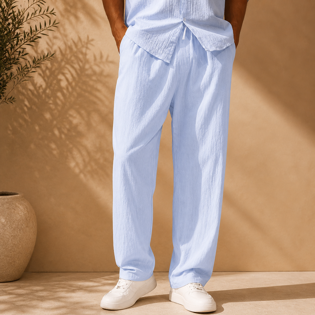 Men's white elasticated waist straight leg trousers