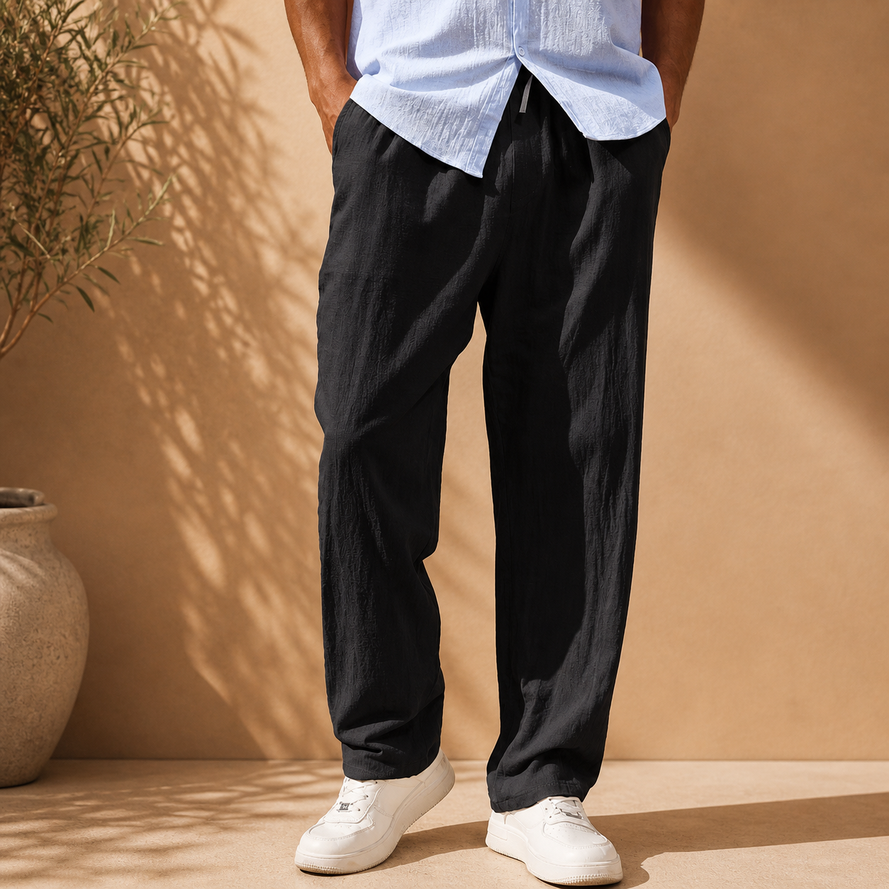 Men's white elasticated waist straight leg trousers