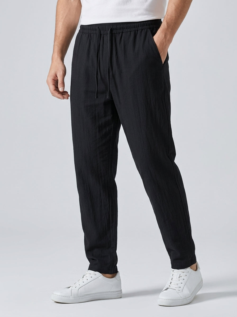 Men's light brown relaxed-fit linen trousers with drawstring