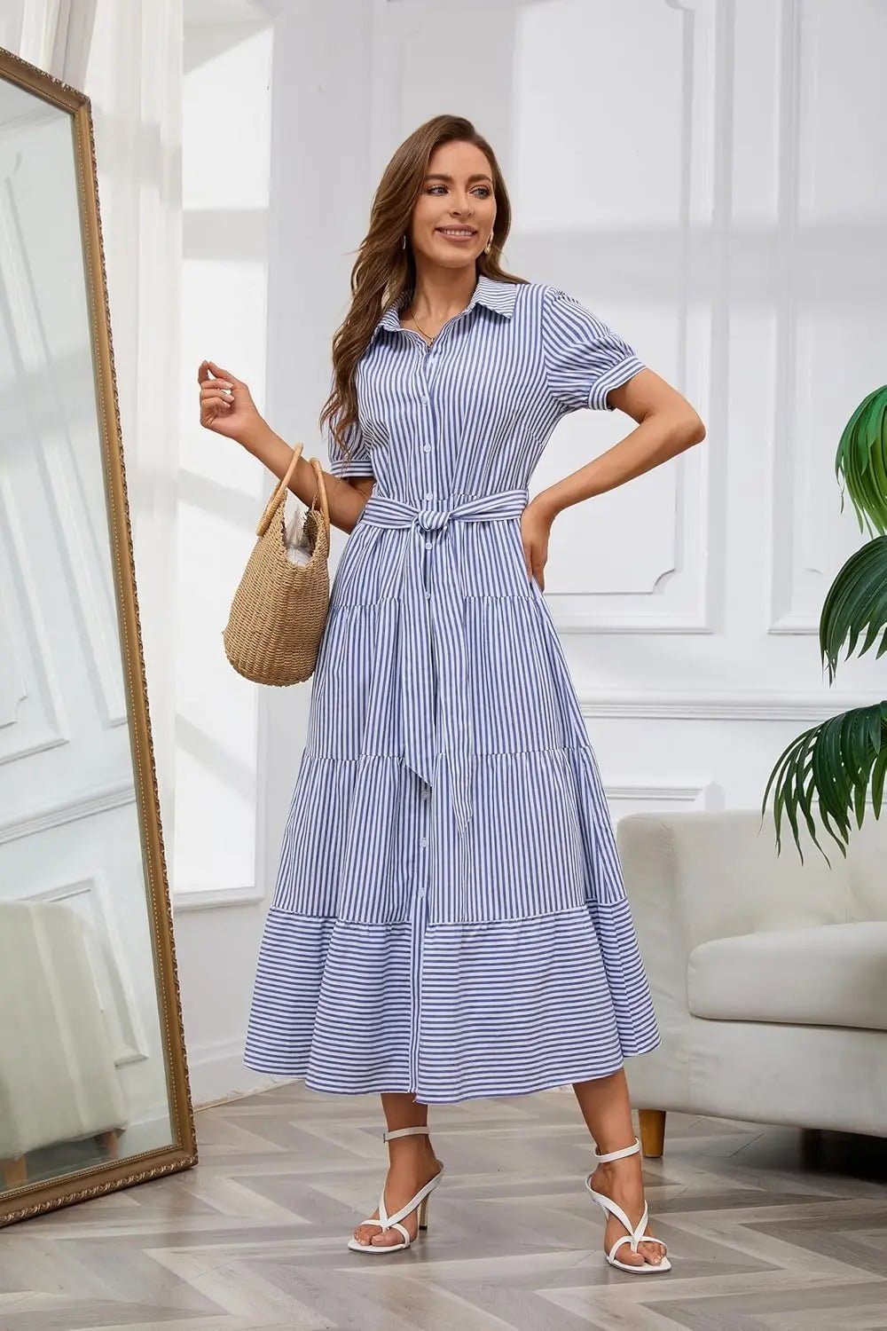 Women's blue striped maxi dress with tiered hem and tie waist