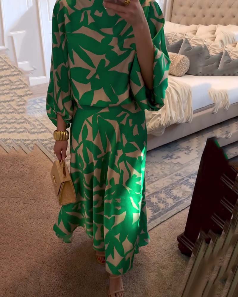 Women's blue leaf print top and midi skirt co-ord set with lantern sleeves