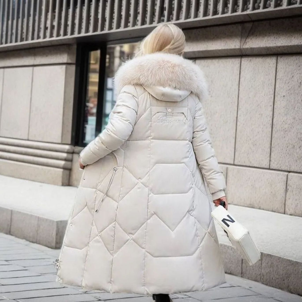 White quilted parka coat with faux fur hood trim, cosy for women