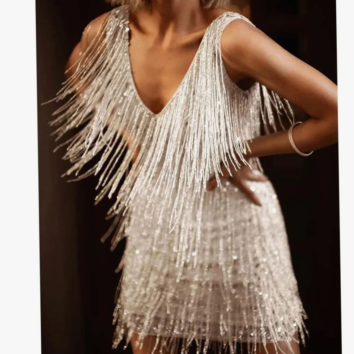Women's sequin fringe cocktail dress in silver with A-line mini skirt