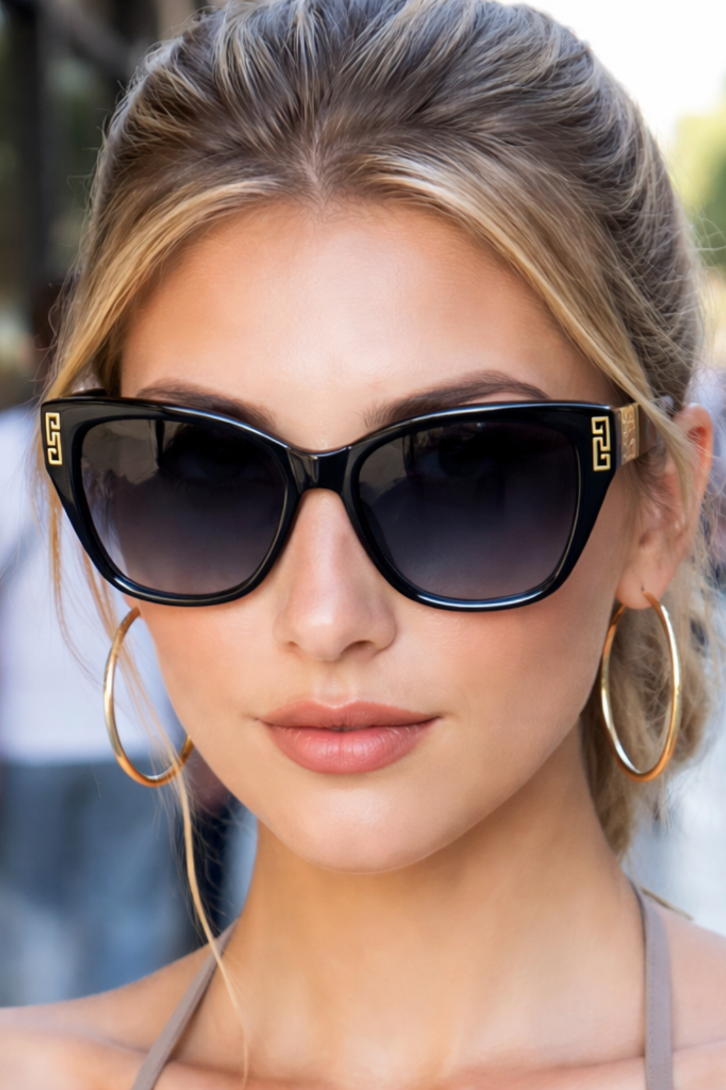 Women's cat eye sunglasses with gradient lenses and gold detail