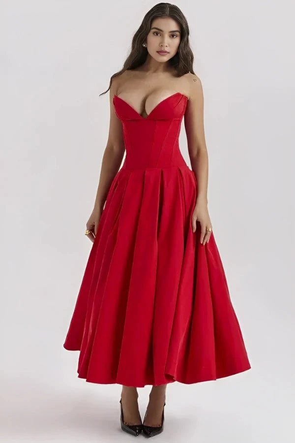 Women's pink corset midi dress with a structured bodice and full skirt