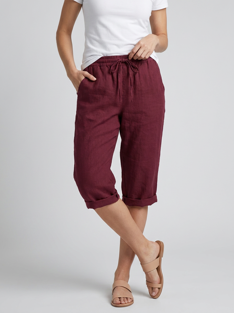 Women's orange wide-leg linen shorts with drawstring waist