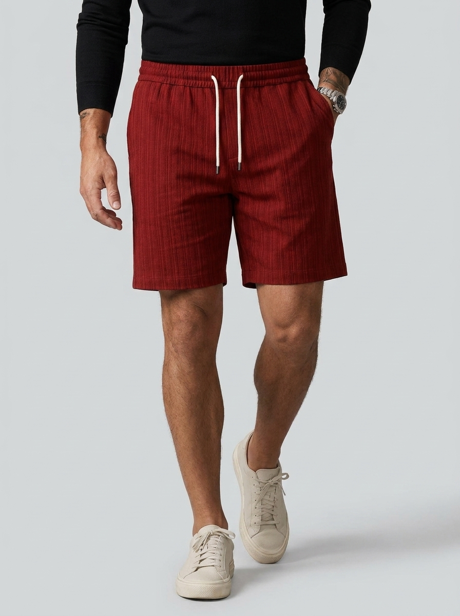 Men's light blue linen shorts with elastic waist and drawstring