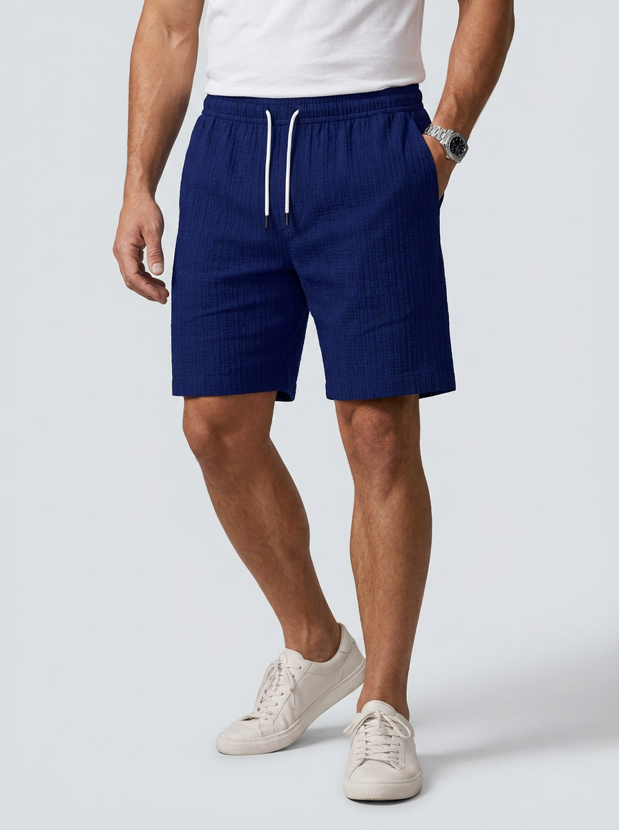 Men's white linen shorts with elastic waist and drawstring
