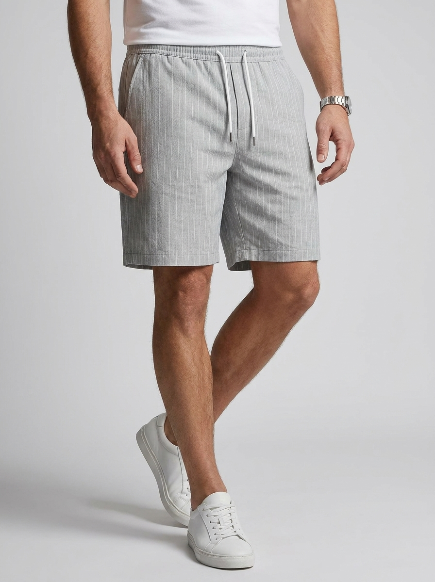 Men's light blue linen shorts with elastic waist and drawstring
