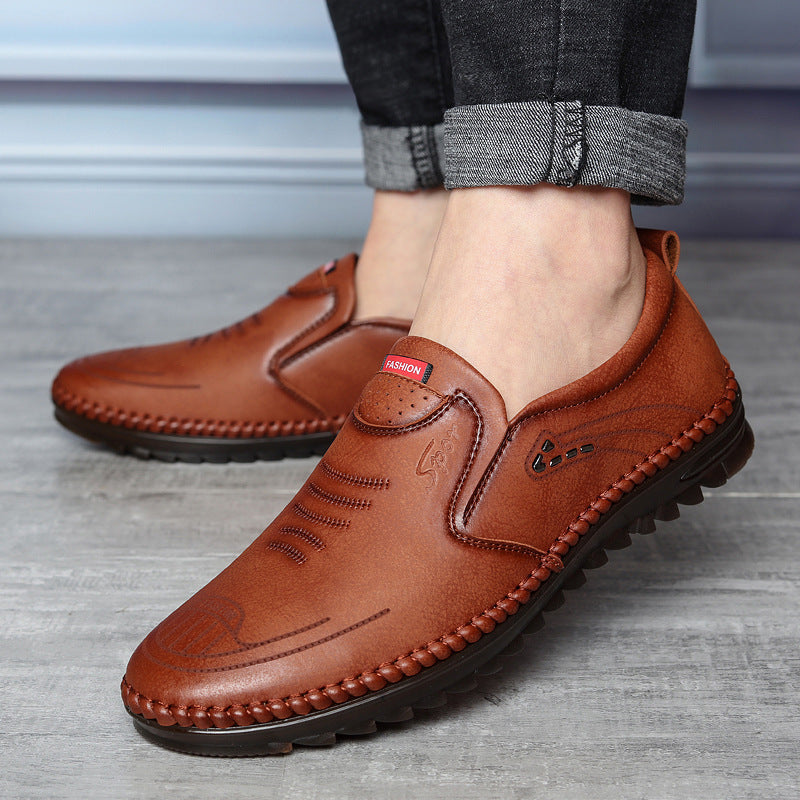 Men's black slip on leather loafers with moccasin stitch detail