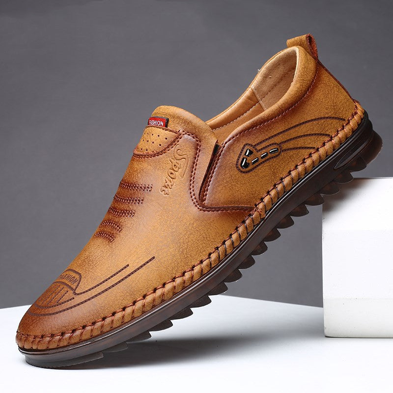 Men's black slip on leather loafers with moccasin stitch detail