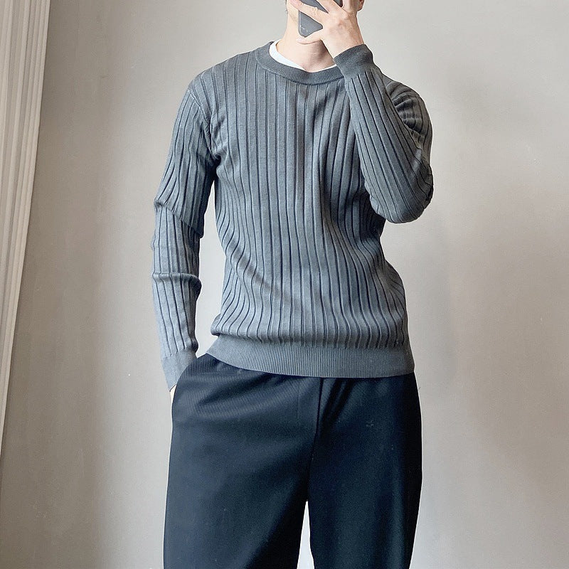 Grey Crew Neck Jumper worn by a model, close-up front view