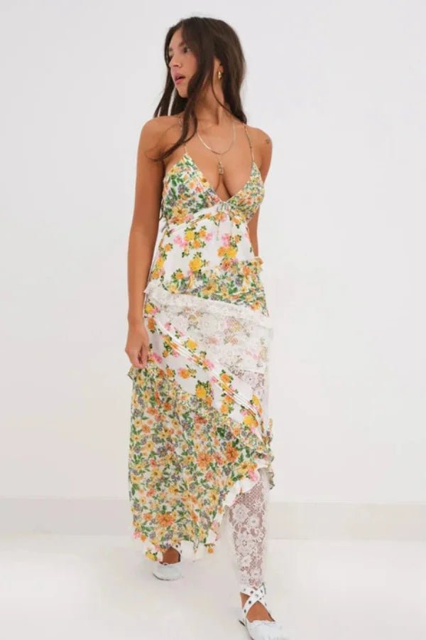 Women's green floral maxi dress with a plunging neckline and ruffles