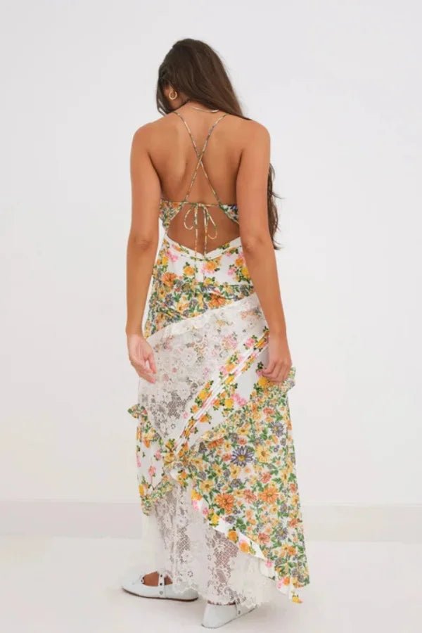Women's green floral maxi dress with a plunging neckline and ruffles