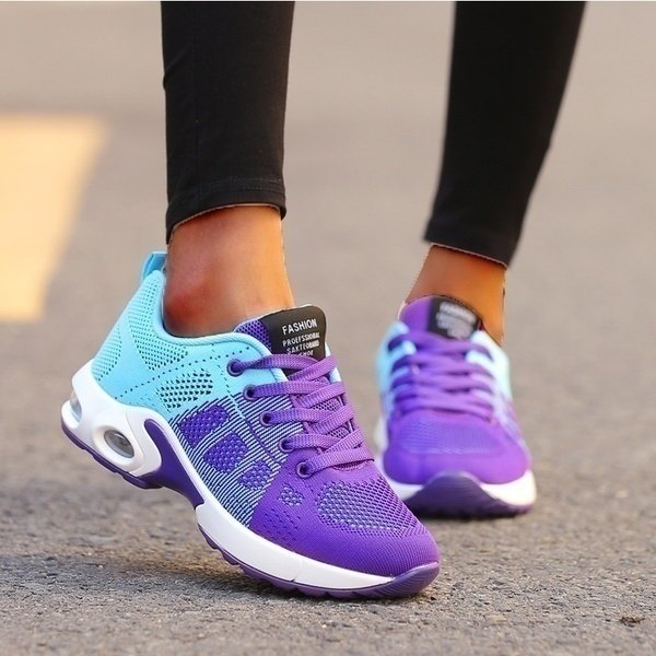 Women's black mesh walking trainers with cushioned sole and lace-up fit