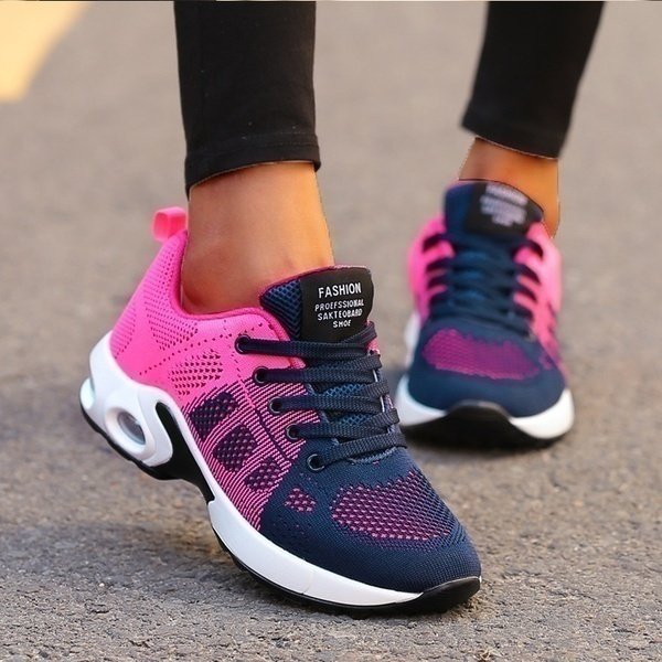 Women's black mesh walking trainers with cushioned sole and lace-up fit