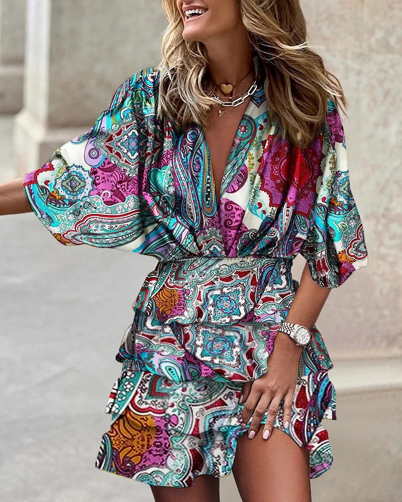 Women's green boho ruffle mini dress with a printed design