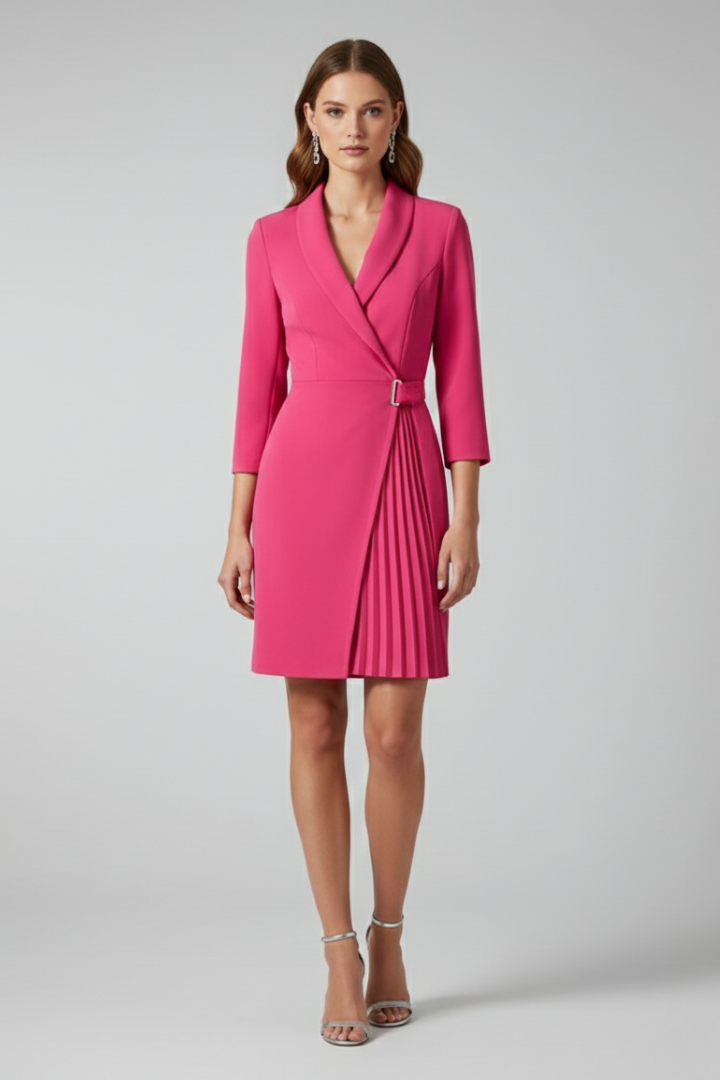 Women's pink notched collar blazer dress with a defined waist and straight hem