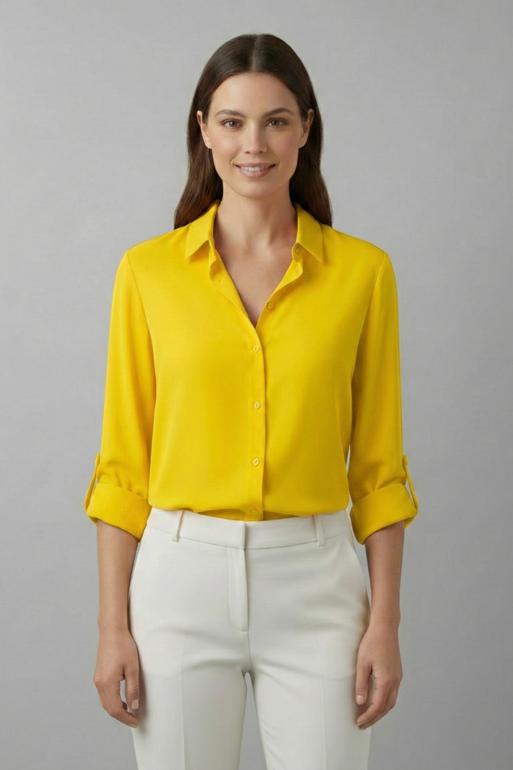 Women's white collared blouse with button front and rolled cuffs