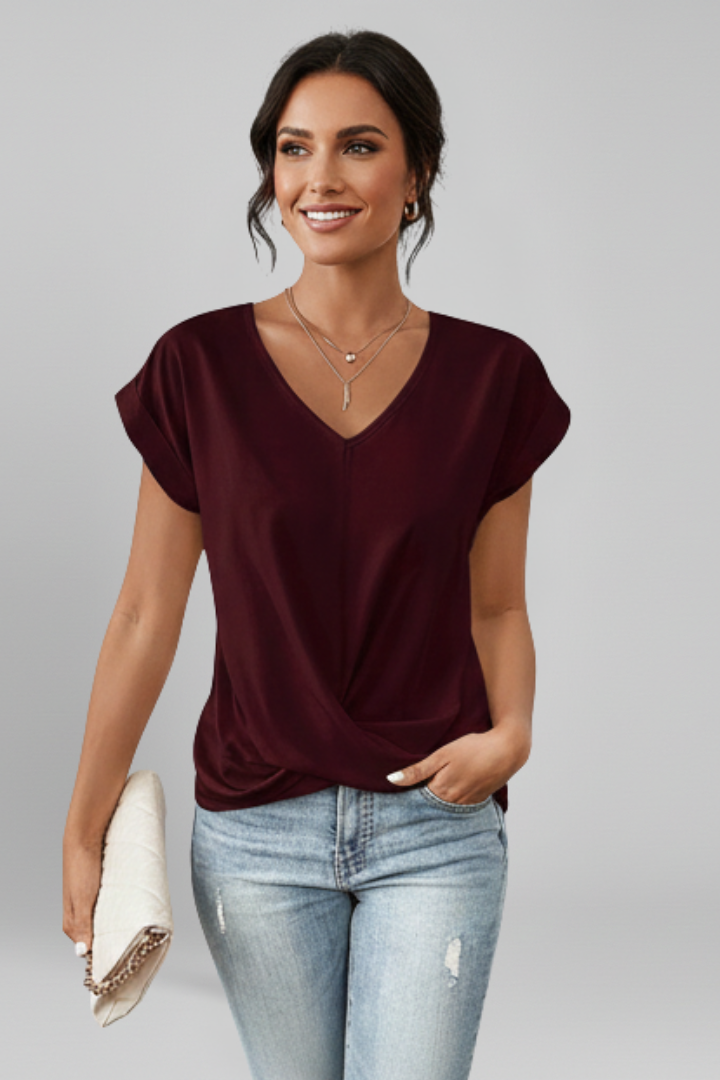 Women's red V-neck blouse with short sleeves and relaxed fit