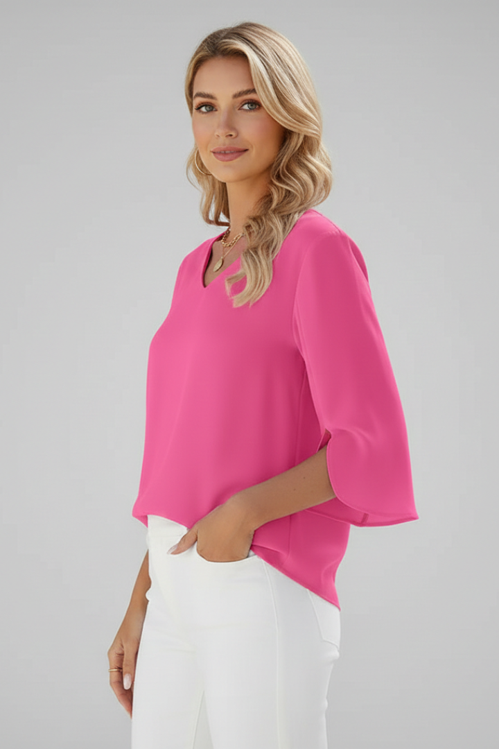 Women's pink short sleeve blouse with V-neck and chest pocket