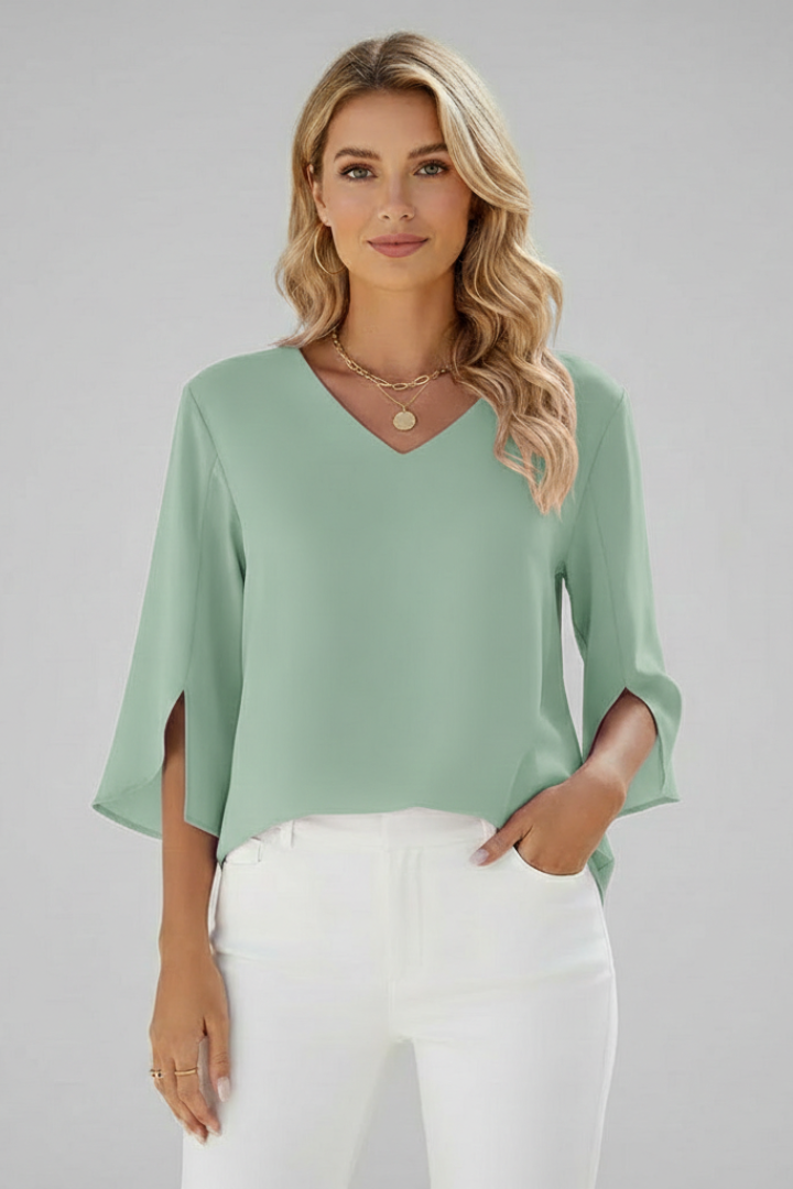 Women's blue short sleeve blouse with V-neck and chest pocket