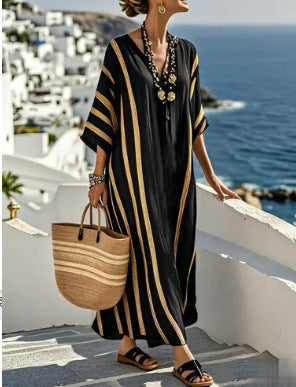 Women's light blue boho kaftan maxi dress with batwing sleeves and fringe hem