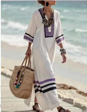 Women's beige boho kaftan maxi dress with batwing sleeves and fringe hem