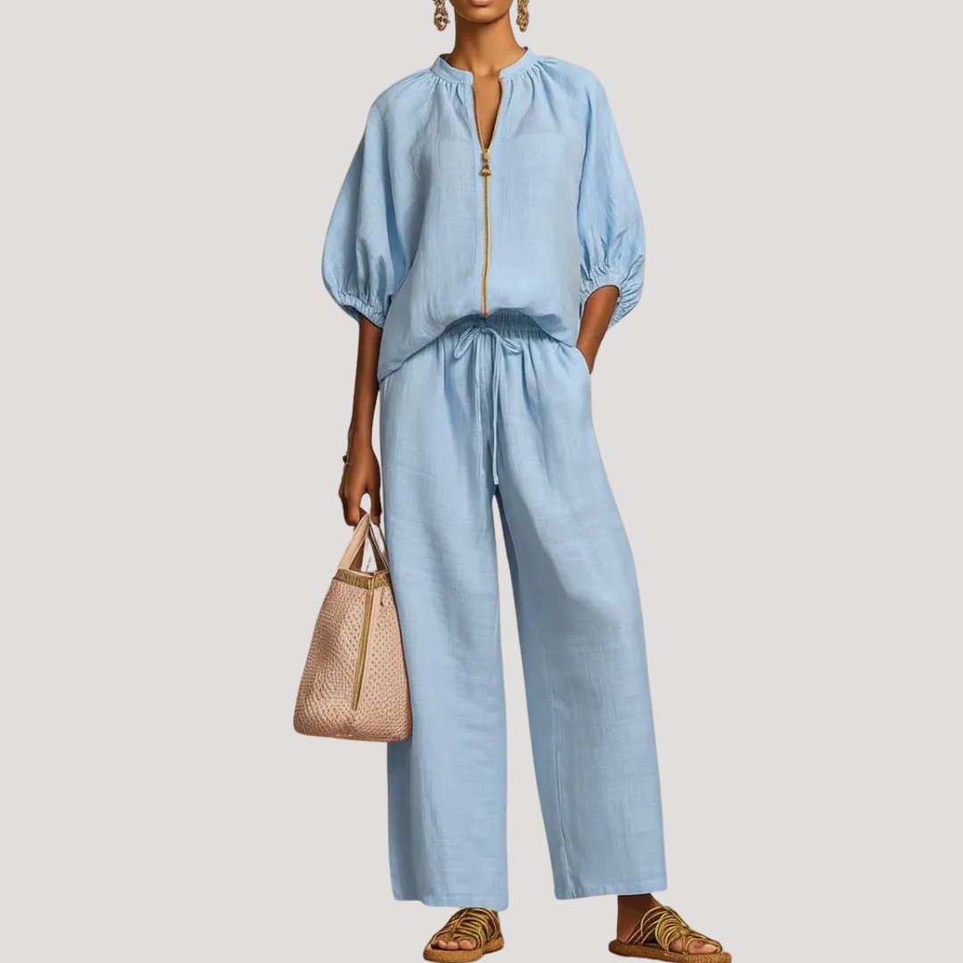 Women's light blue linen co-ord set with balloon sleeve top and wide leg trousers