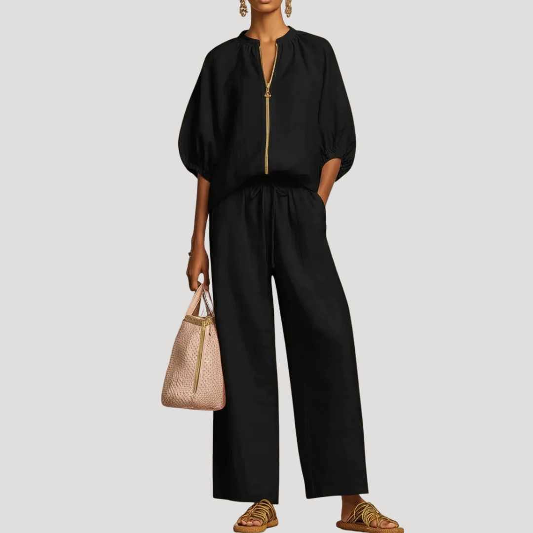 Women's light blue linen co-ord set with balloon sleeve top and wide leg trousers