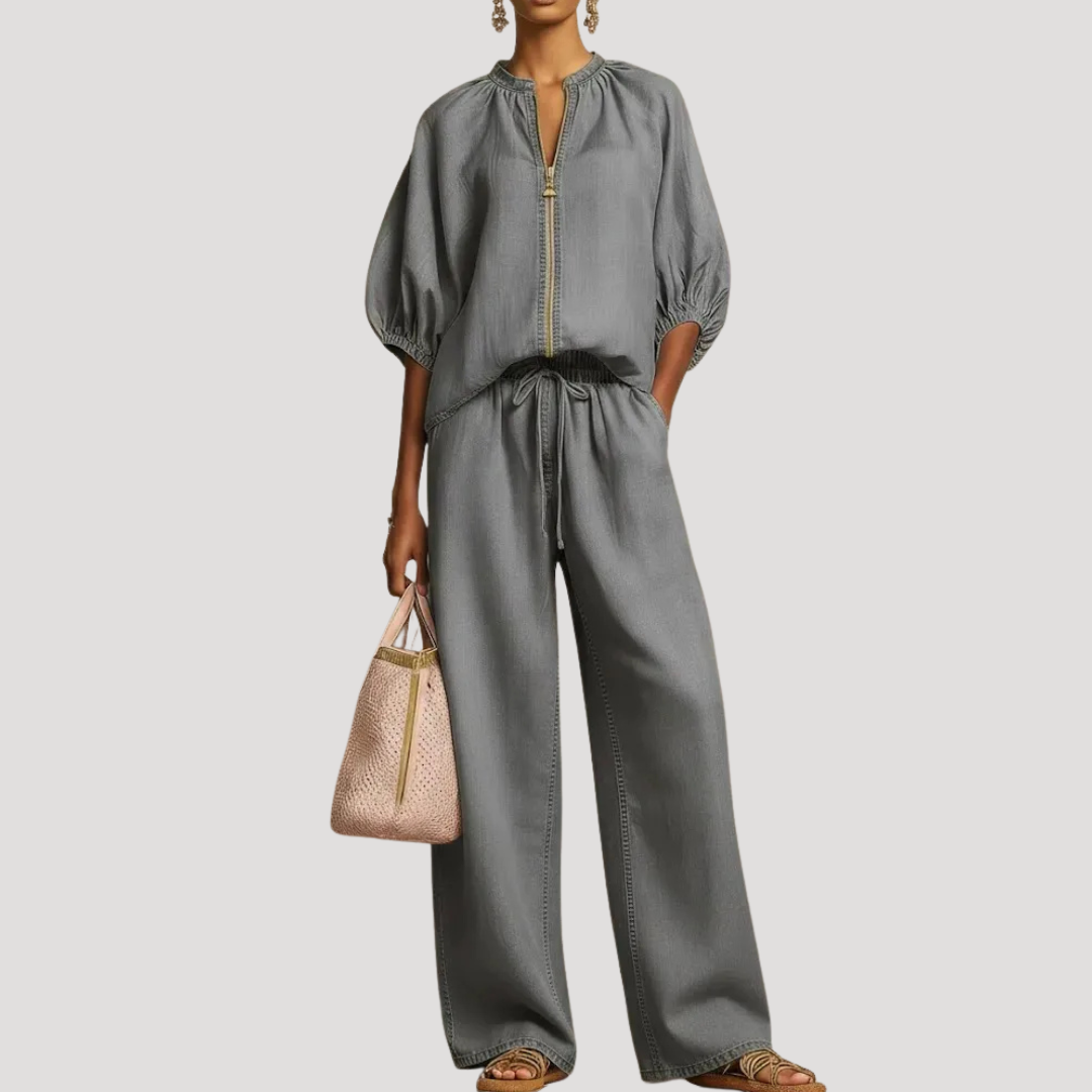 Women's black linen co-ord set with balloon sleeve top and wide leg trousers