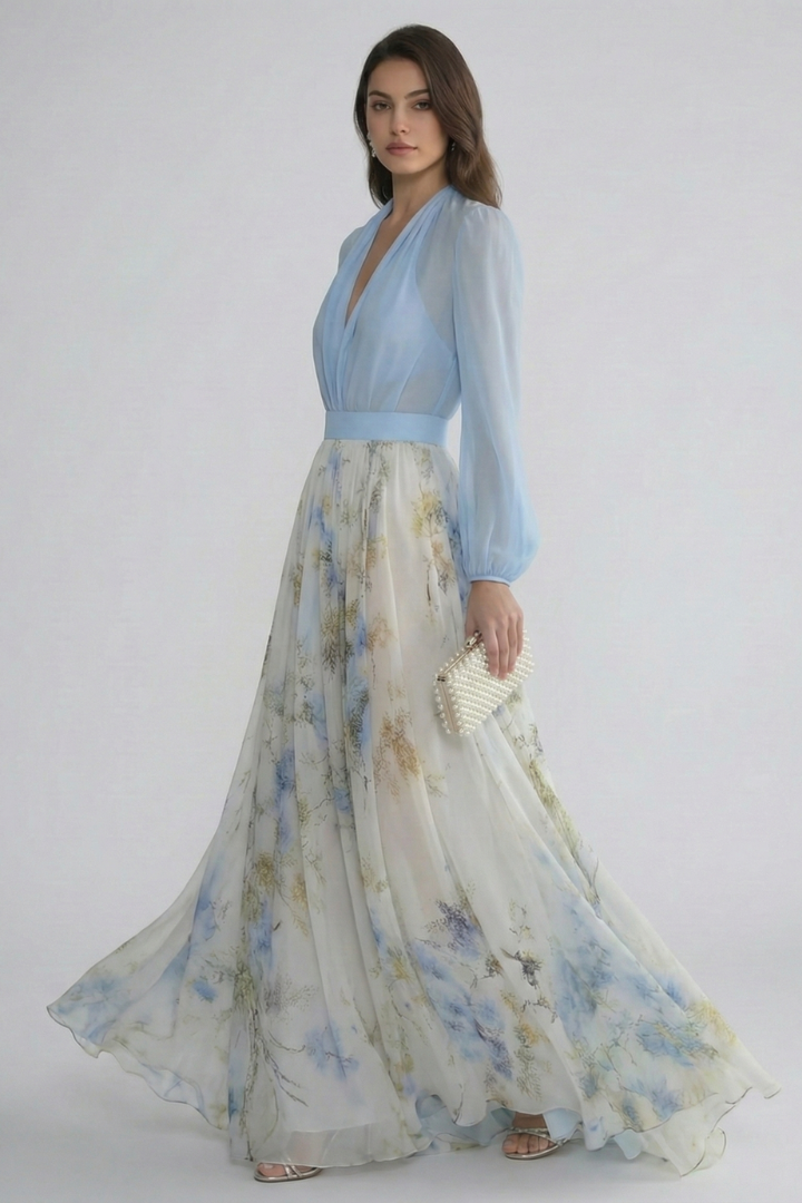 Women's light blue floaty maxi dress with sheer sleeves and V-neckline