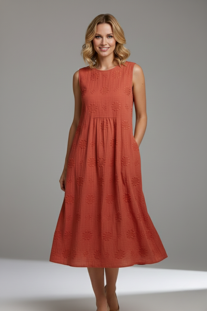 Women's green sleeveless textured midi dress with pockets