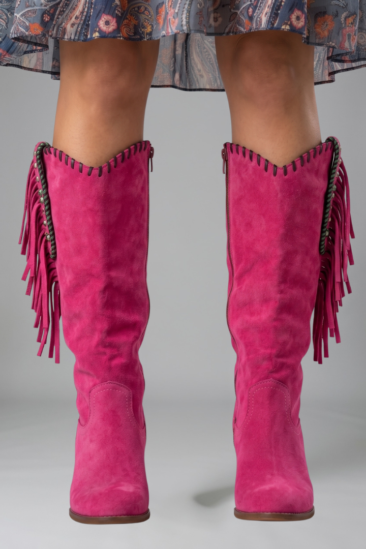 Women's pink western boots with fringe trim and studded block heel detailing