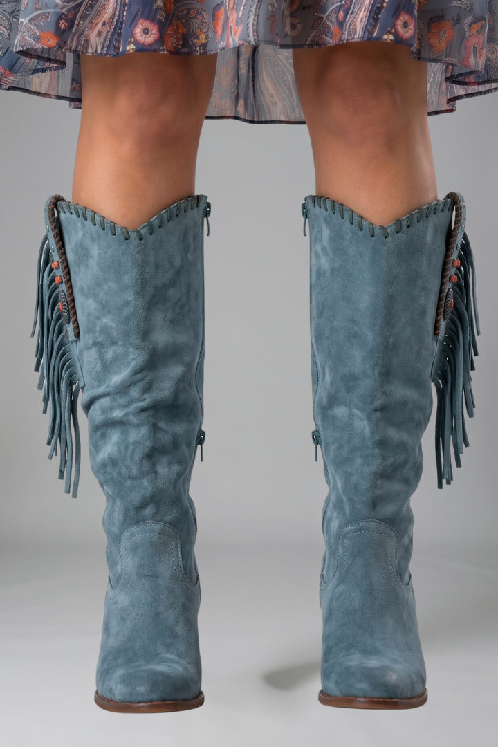 Women's pink western boots with fringe trim and studded block heel detailing