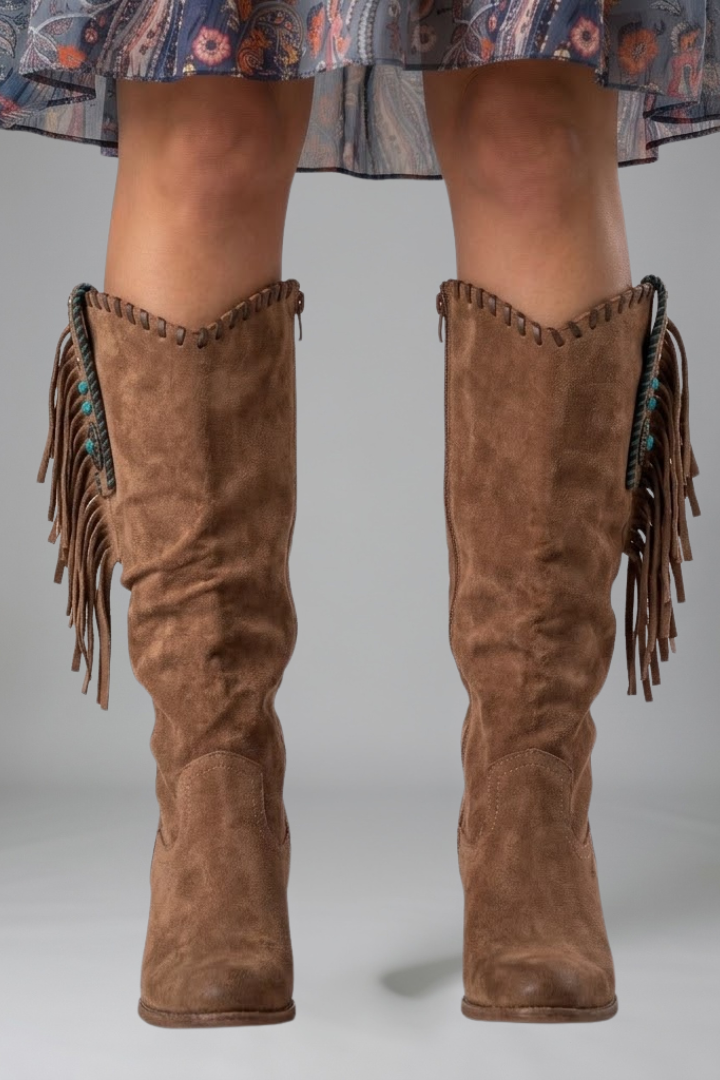 Women's pink western boots with fringe trim and studded block heel detailing