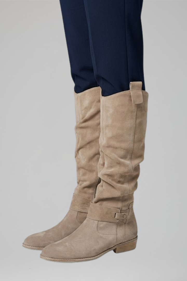 Women's beige knee-high boots with side zip closure and faux suede finish