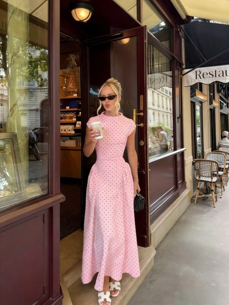 Women's pink polka dot maxi dress with cap sleeves and high neck